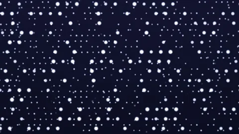 Snowflakes fall on dark background creating a winter scene Stock Footage 339090453