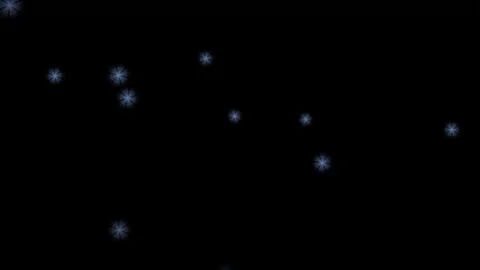Snowflakes fall gently in a dark winter night sky Stock Footage 338300866