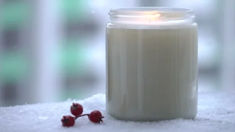 Snowflakes fall on the teddy bear sitting on a balcony on a winter day Stock Footage 262262174