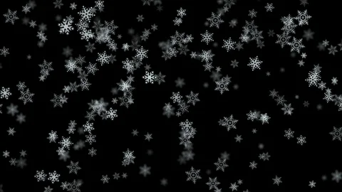 Snowflakes falling against black background 库存影片 97943688