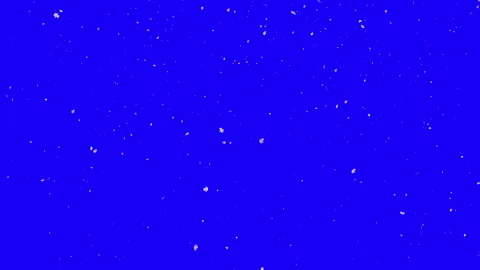 Snowflakes falling against a blue background. Stock Footage 311322591