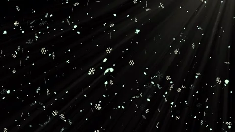 Snowflakes falling against dark background with ethereal light beams Stock Footage 327567913