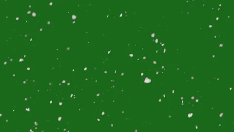 Snowflakes falling fast during snowfall on green screen Stock Footage 315906275