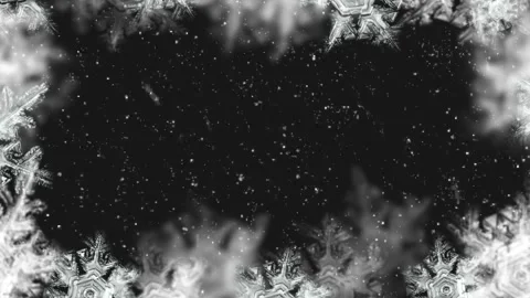 Snowflakes falling slowly on black background Stock Footage 337443865