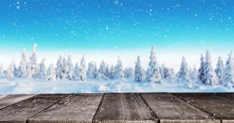 Snowflakes gently falling in slow motion, wooden planks on foreground. Stock Footage 321682214