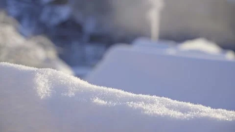 Snowflakes glitter in the sun close-up Stock Footage 239358141