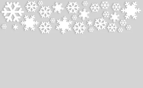 Snowflakes on gray background with copyspace Stock Photos