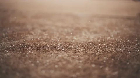 Snowflakes hitting the pavement. Stock Footage 237701465