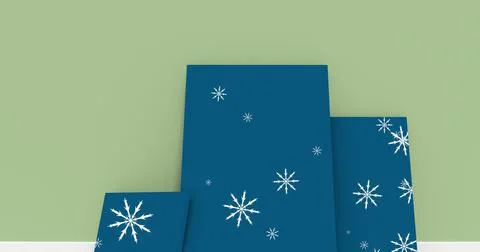 Snowflakes icons falling over three blue frames against copy space on grey Stockillustratie