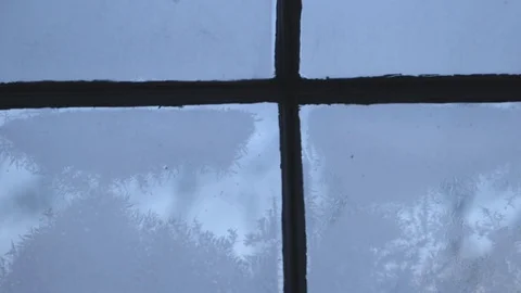 Snowflakes over the glass window Stock Footage 83864968