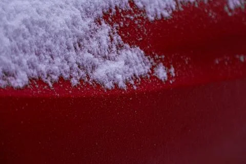 Snowflakes on red textured surface Stock Photos