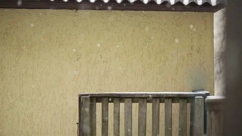 Snowflakes smoothly fall Stock Footage 70933311