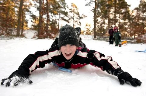 Snowgliding on belly Stock Photos
