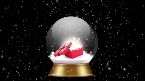 Snowglobe animation with falling snow on a black background Stock Footage 70027101