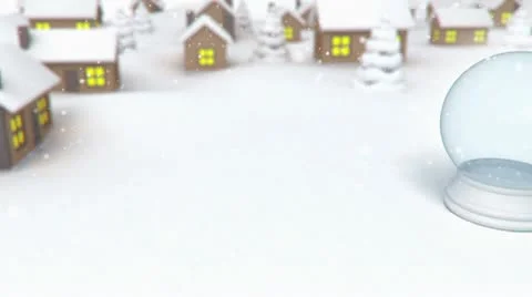 Snowgloube on village background Stock Footage 8992475