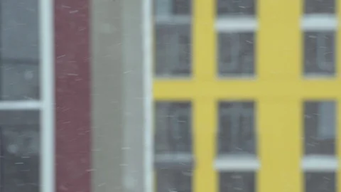 Snowing against building blurred Stock Footage 103112752