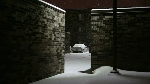 Snowing Between Buildings Video stock 70739989