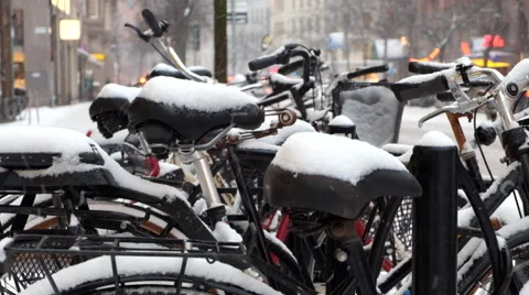 Snowing at bicycles Stock Footage 46511291