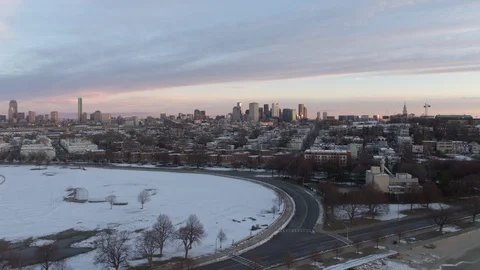 Snowing in Boston, pull back to reveal city 스톡 동영상 112121944