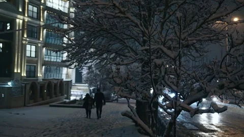Snowing in the City at Night Stock Footage 302800717