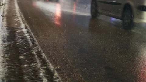 Snowing in the City at Night Stock Footage 302802270