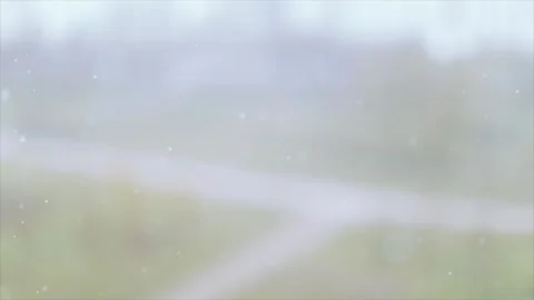 Snowing in the city in spring 스톡 동영상 169244603