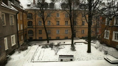 Snowing on a courtyard Stock Footage 596721