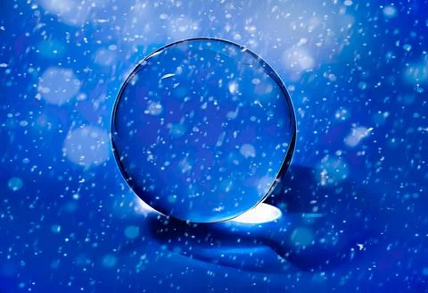 Snowing in a crystal ball Stock Photos
