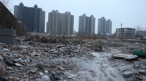 Snowing on the demolition area in a 3rd tier city in China Stock Footage 46727938