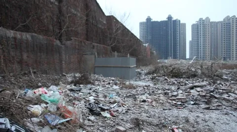 Snowing on the demolition area in a 3rd tier city in China Stock Footage 46728346
