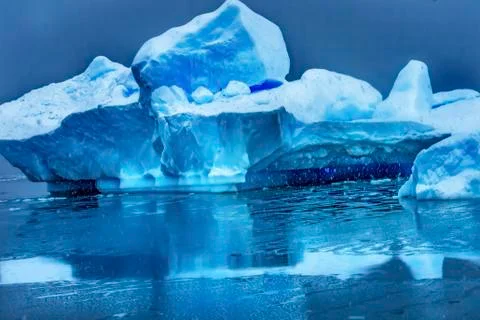 Snowing Floating Blue Iceberg Reflection Paradise Bay Skintorp Cove Antarctic Stock Photos