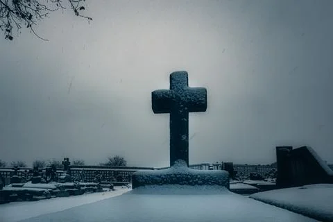 Snowing on the graveyard cross Stock Photos