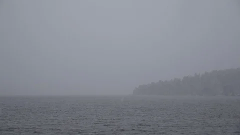 Snowing at the lake 2 (12-bit RAW) Stock Footage 96596959