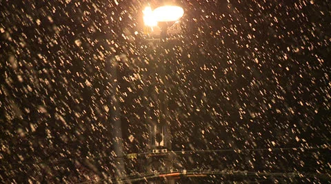 Snowing at night Stock Footage 23425403