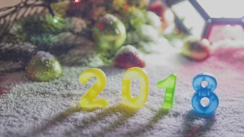 Snowing on the numbers of 2018 Stock Footage 81877149