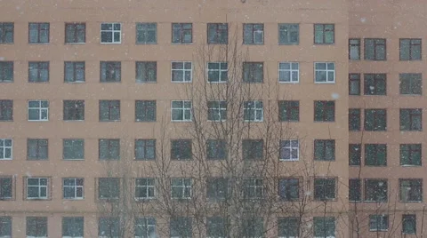 Snowing over square window building 스톡 동영상 58298335