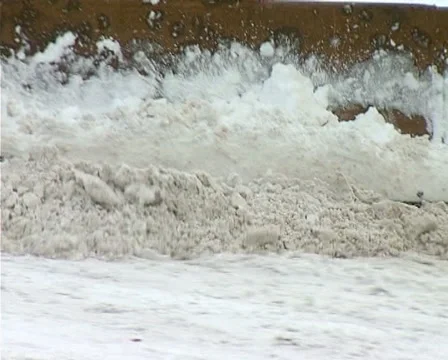 Snowing on road Stock-Footage 1100393