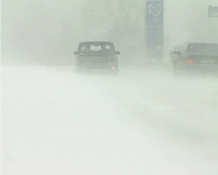 Snowing on road Stock Footage 1100417
