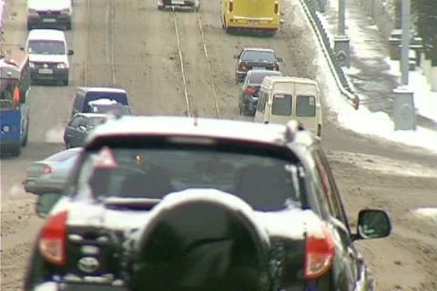 Snowing on road Stock-Footage 1100448