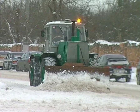 Snowing on road Stock Footage 1100503