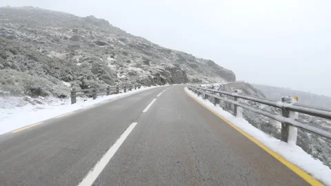 Snowing on the road Stock Footage 167606469