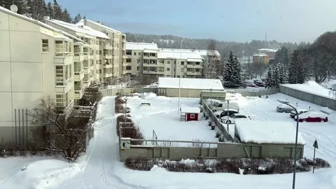 Snowing in a suburb Stock Footage 147616472