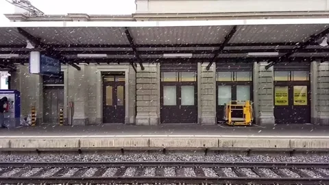 Snowing in train station Video stock 247036743