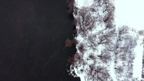 Snowing under the river Stock Footage 195850125
