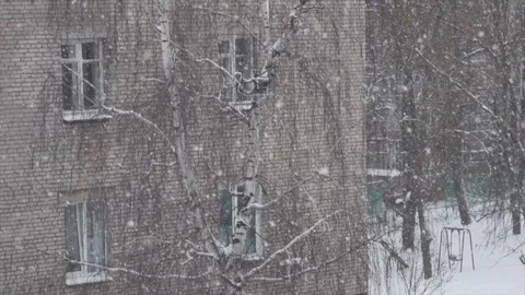 Snowing in the yard. Slow motion Stock Footage 100670475
