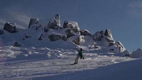 Snowkiter Going Down the Mountain Hill 4K Video stock 76514125