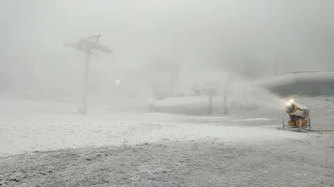 Snowmaking using snow guns to prepare a snow cover Video stock 227946490