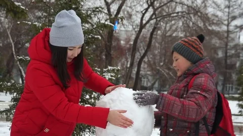 The snowman is almost ready Stock Footage 83967140