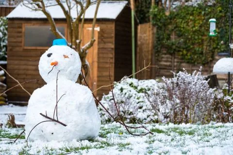 Snowman in Back Garden Stock Photos