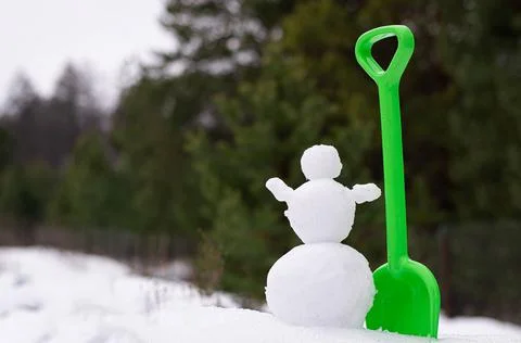 Snowman on the background of the forest Stock Photos